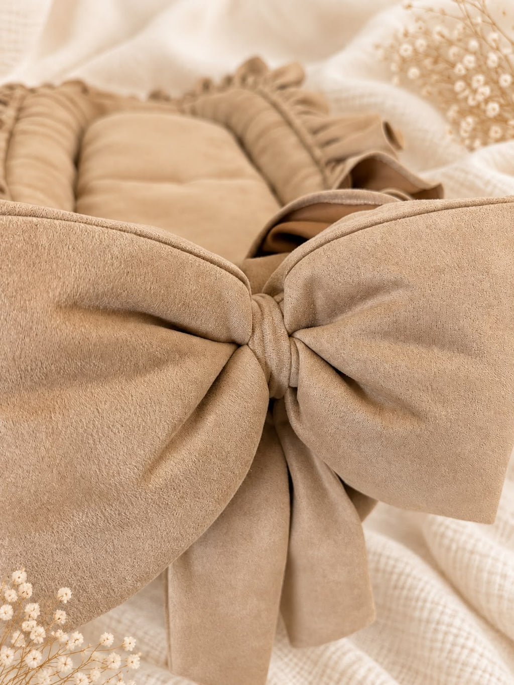 Personalized suede baby nest with blanket.